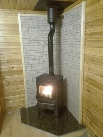 Монтаж чугунной печи Guca Lava с дымоходом Magma